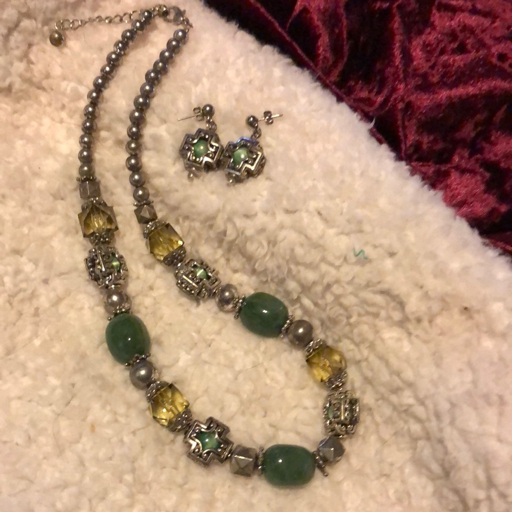 Necklace and earrings.  No brand listed.